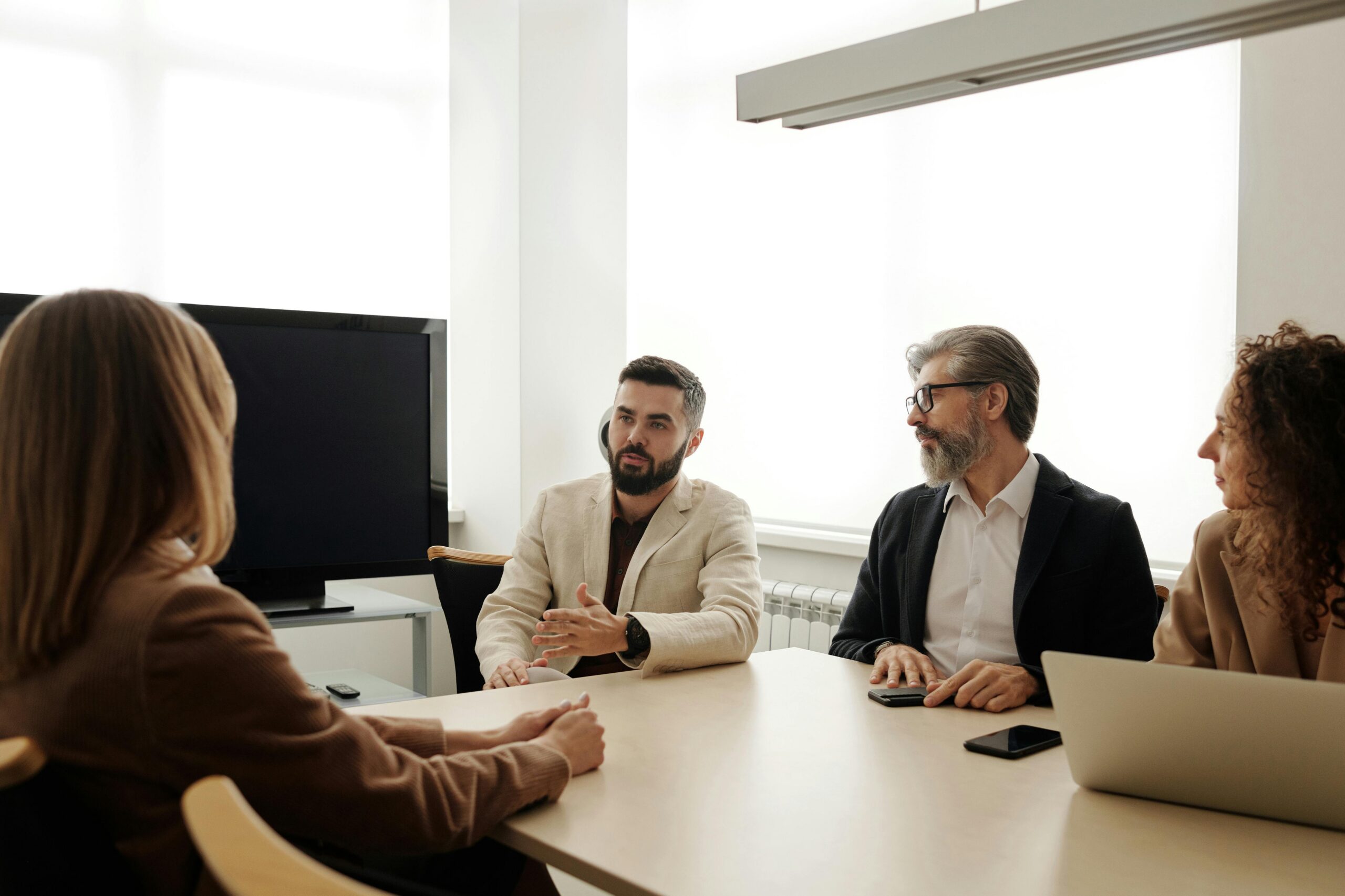 A group of people having a conversation.