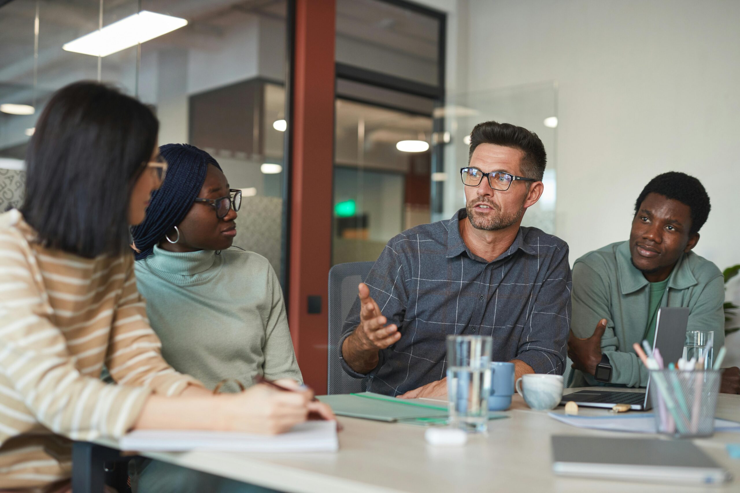 Three people in the middle of planning.